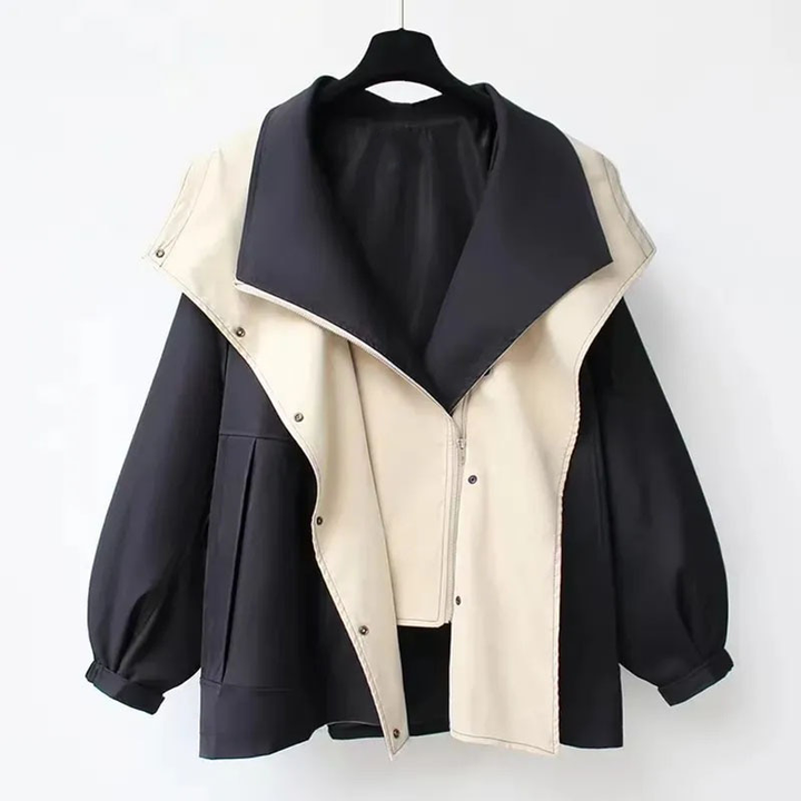 Veste imperméable 3-en-1 femme, coloris actuel. Idéale pour le printemps, allie mode, confort et fonctionnalité.