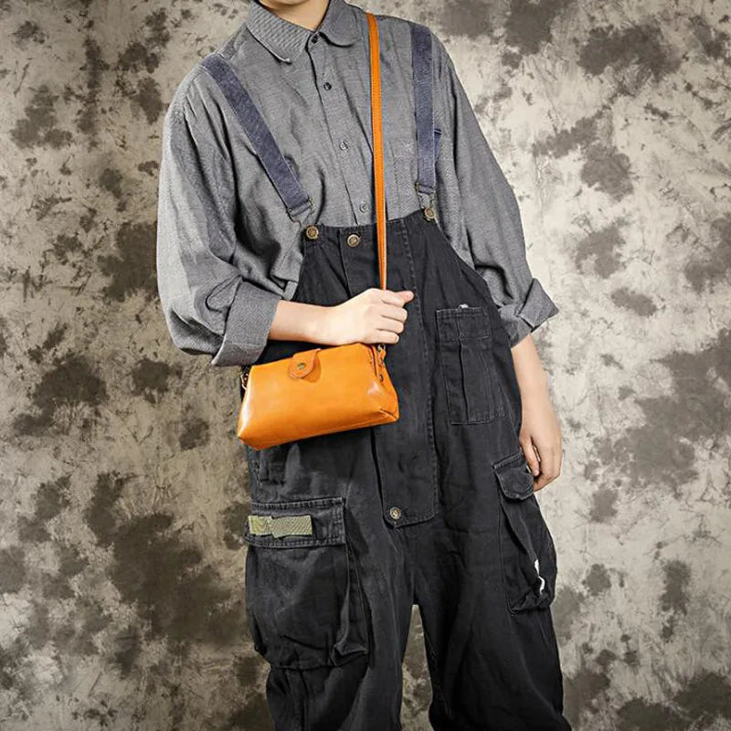 Sac bandoulière noir Amber en cuir élégant, avec bandoulière réglable. Mode femme.
