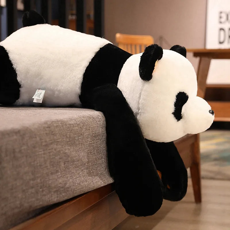Peluche panda géant, très douce et câline, idéale pour les câlins des enfants et le confort des adultes.