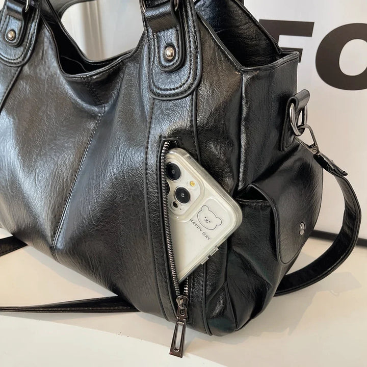 Sac cabas Magda avec bandoulière amovible, offrant polyvalence pour un style quotidien élégant.
