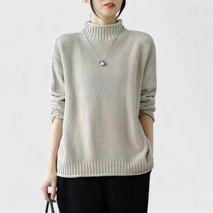 Pull femme Suzi élégant, design épuré, idéal pour une tenue décontractée chic en toute saison.