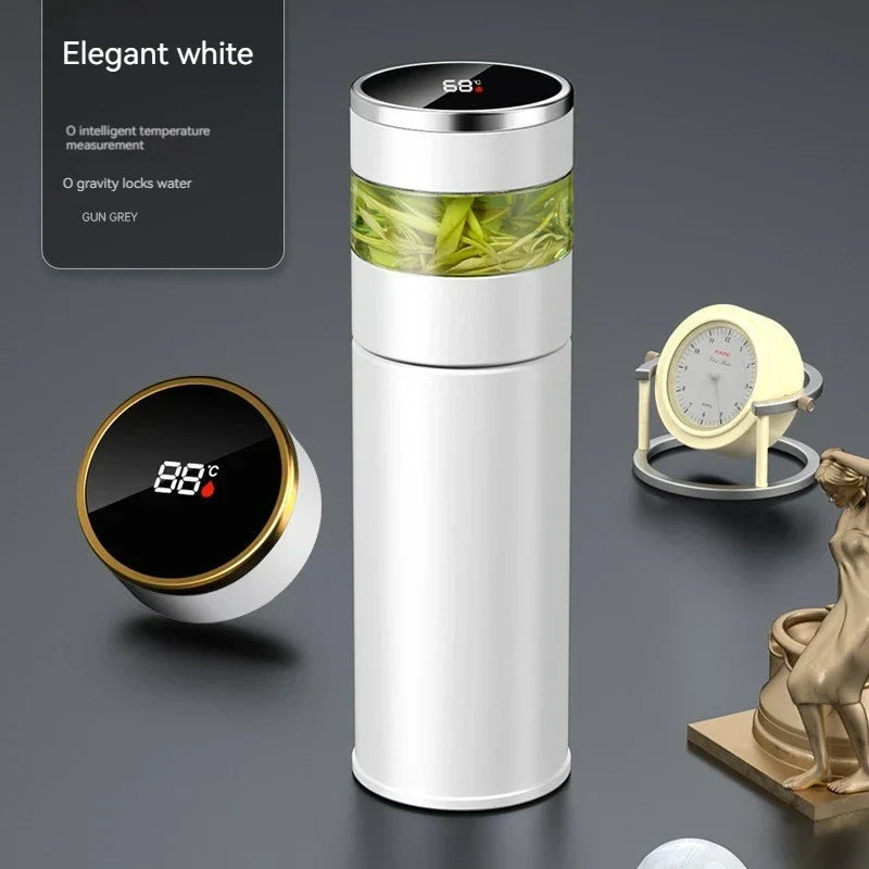 Image d'une bouteille isotherme intelligente en inox, écran LED affichant la température, avec infuseur amovible.