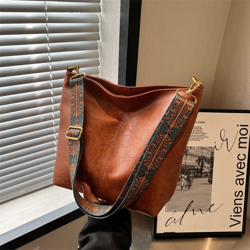 Sac à main vegan élégant pour femme, en PU, style seau, idéal pour un usage quotidien et mode éthique.
