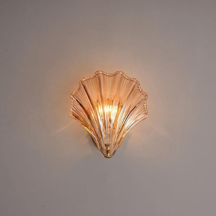 Applique murale coquillage, élégance côtière pour un éclairage d'ambiance parfait.