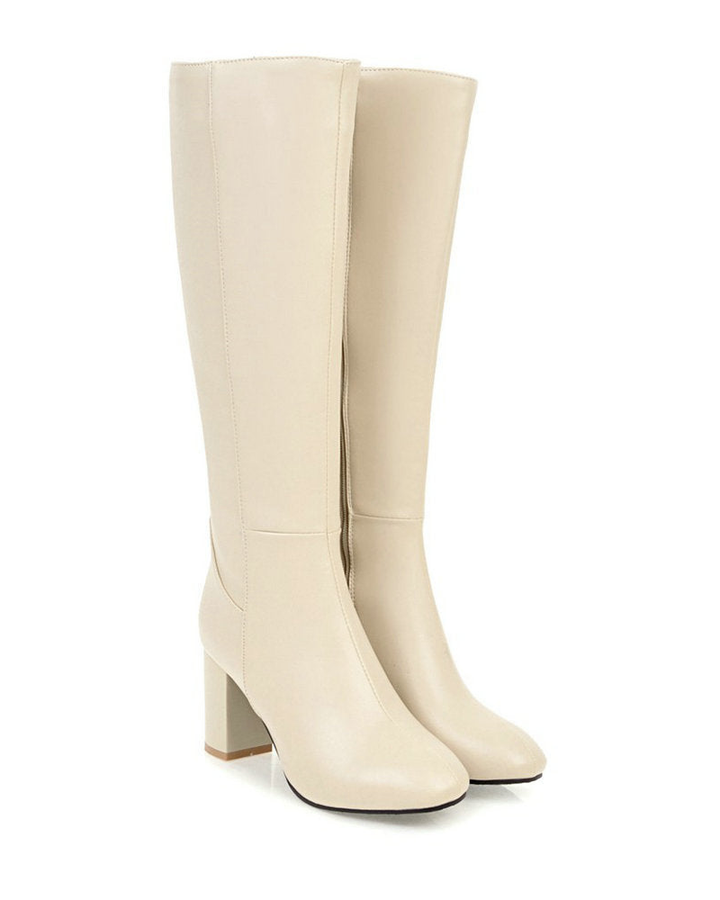 Bottes femme à talon bloc, idéales pour l'automne et l'hiver. Chaussures élégantes et confortables avec zip.