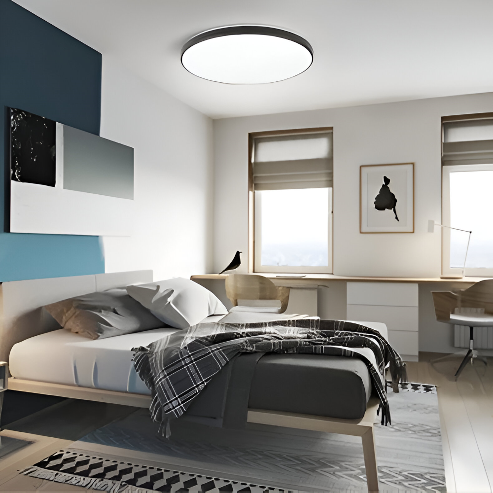 Plafonnier LED rond ultra fin moderne, éclairage design pour salon ou chambre.