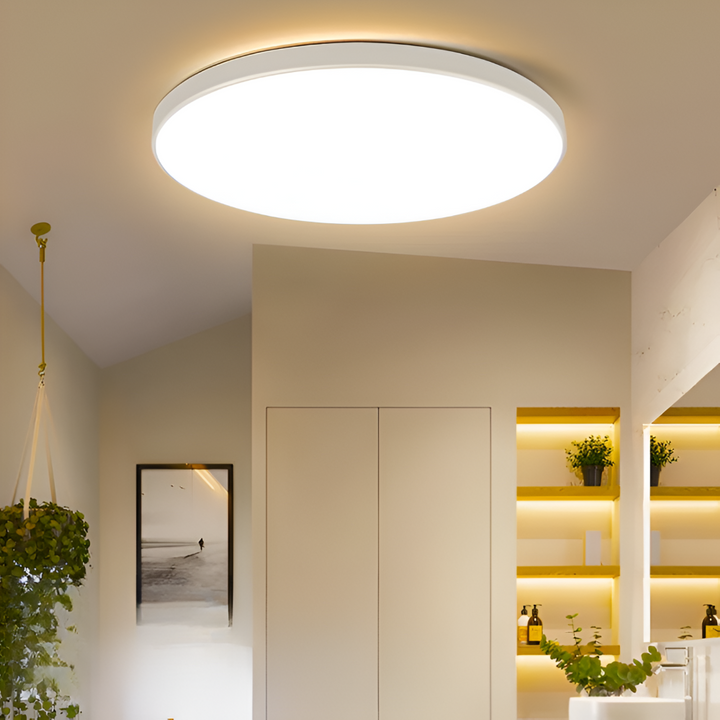 Économisez de l'énergie avec ce plafonnier LED rond design et ultra fin.