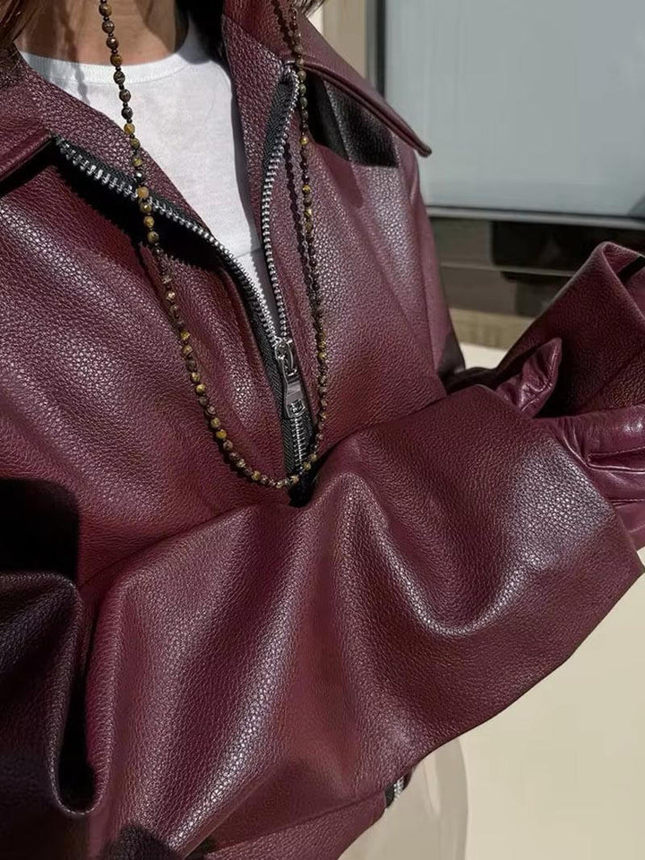 Veste bordeaux femme oversize avec fermeture éclair, style chic et décontracté pour la mi-saison.