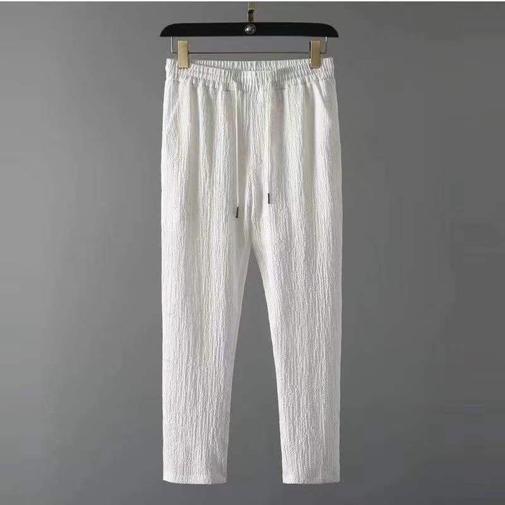 Tissu respirant de l'ensemble lin homme, parfait pour rester au frais avec style et légèreté tout l'été.