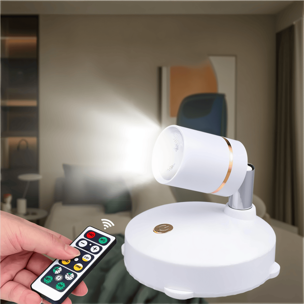 Mini projecteur LED sans fil, design moderne, éclairage d'accentuation discret et puissant.