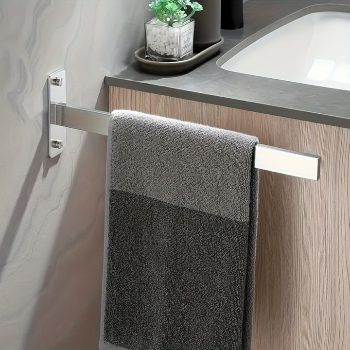 Porte-serviettes simple barre noir mat, fixation murale, optimise l'espace.