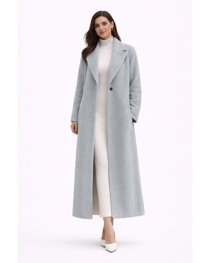 Manteau femme élégant et chaud, coupe oversize pour l'hiver. Tendance et confortable au quotidien.