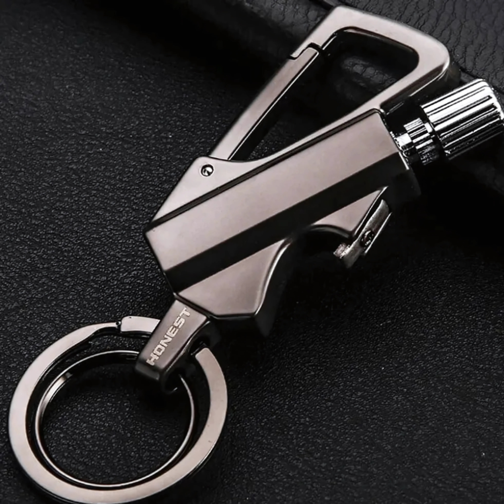 Allume-feu compact et étanche type porte-clés, accessoire de survie indispensable pour l'extérieur.