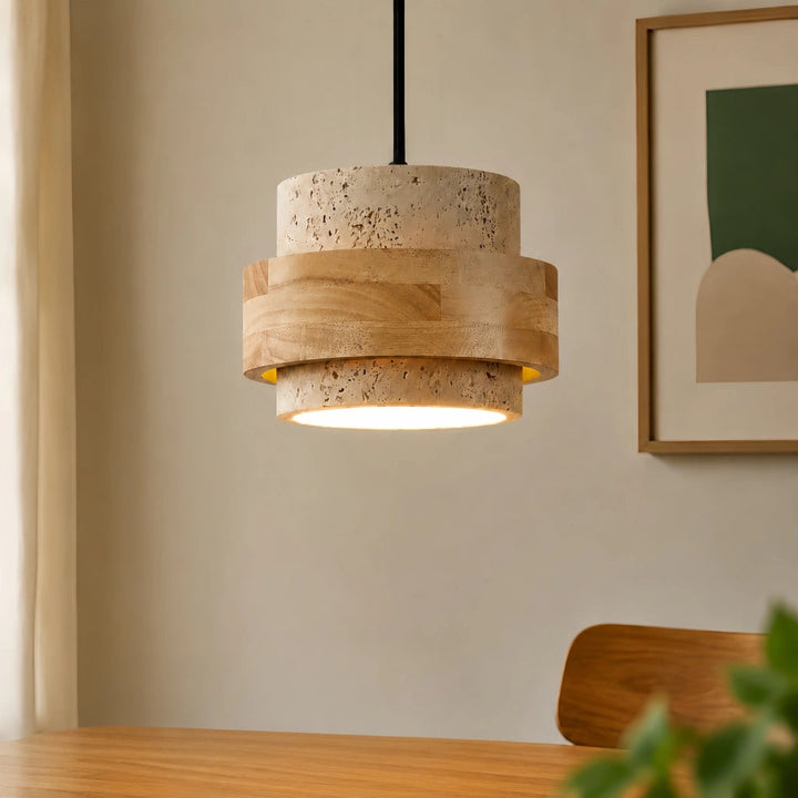 Suspension design travertin, forme cylindrique, ambiance naturelle et élégante.