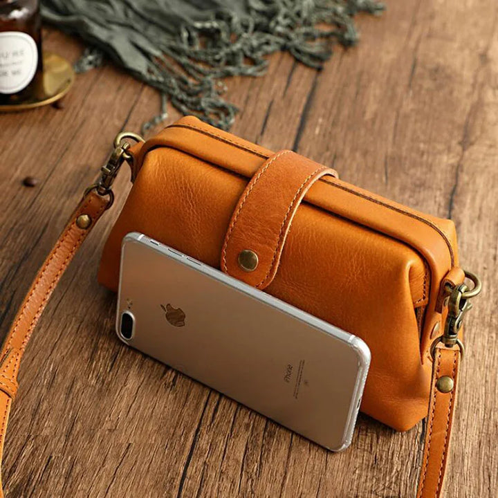 Sac bandoulière Amber marron en cuir véritable, élégant et pratique pour femme.