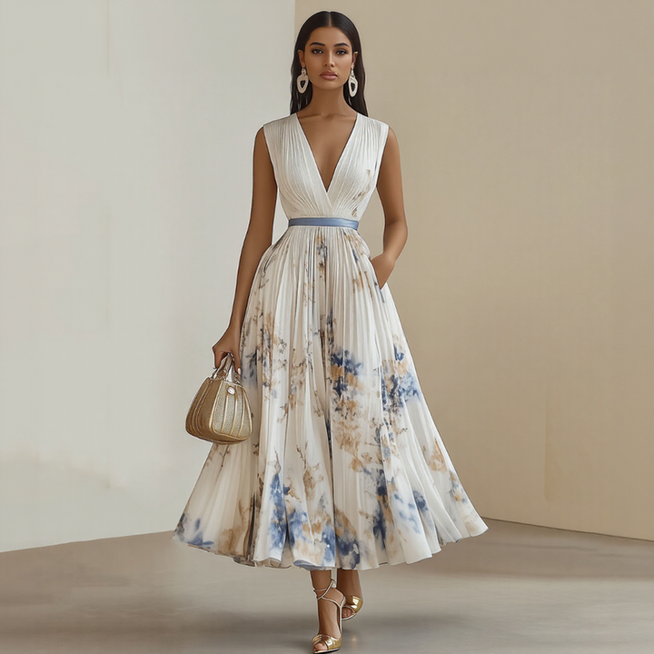 Robe midi fluide Elara pour femme, col V confortable, parfaite pour l'été et look chic.