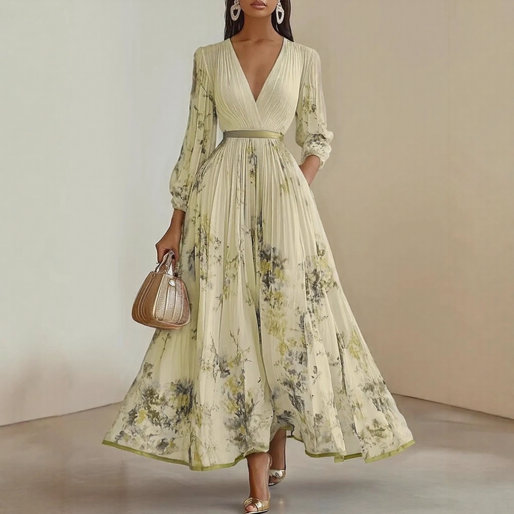 Confortable robe midi Elara pour femme, col V, sans manches, fluide, parfaite pour les journées d'été.