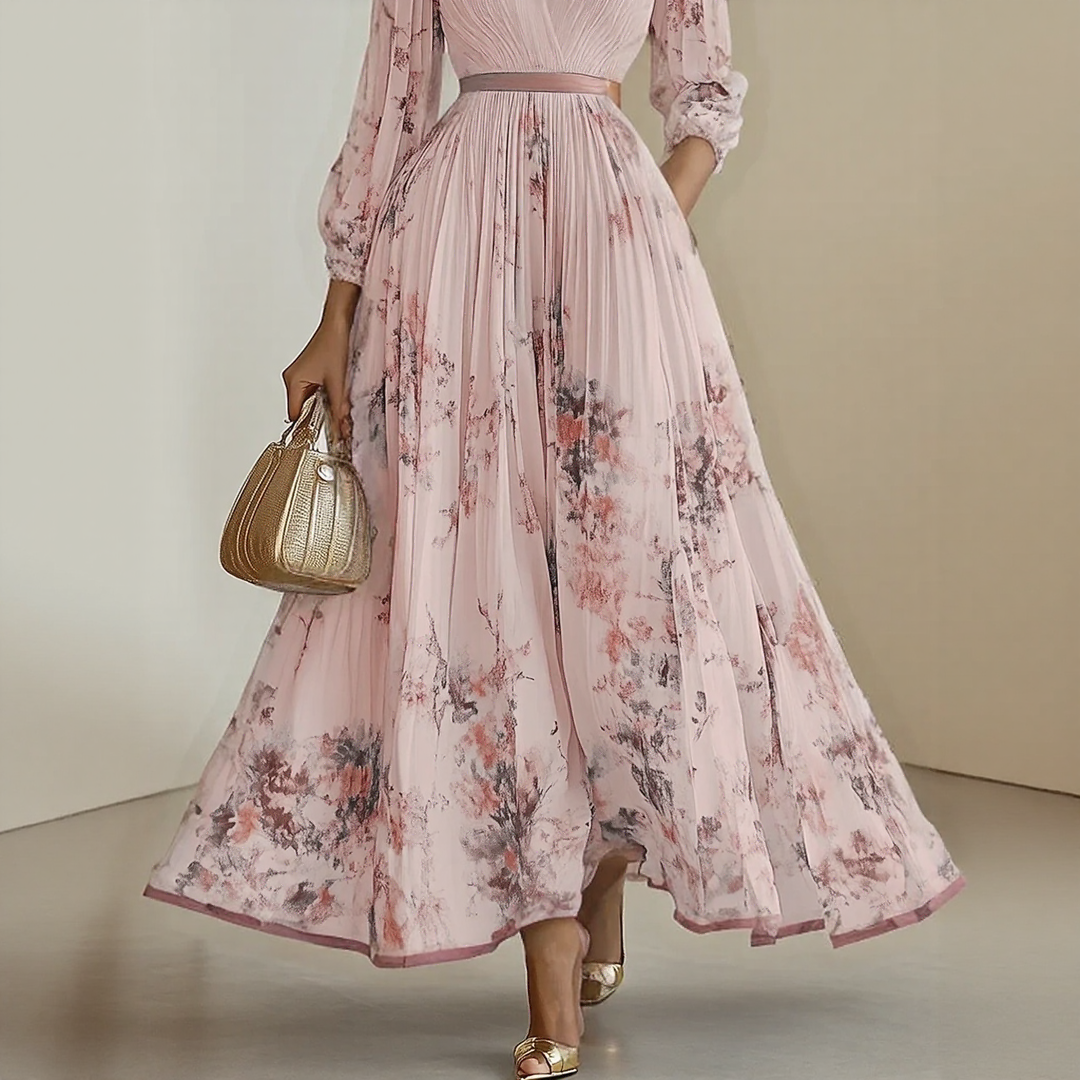 Robe Elara midi pour femme, col V flatteur, coupe fluide, sans manches, élégance estivale.