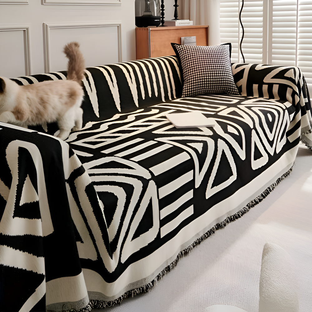 Décoration bohème avec ce jeté de canapé en chenille. Plaid douillet à franges, une couverture antidérapante chic.