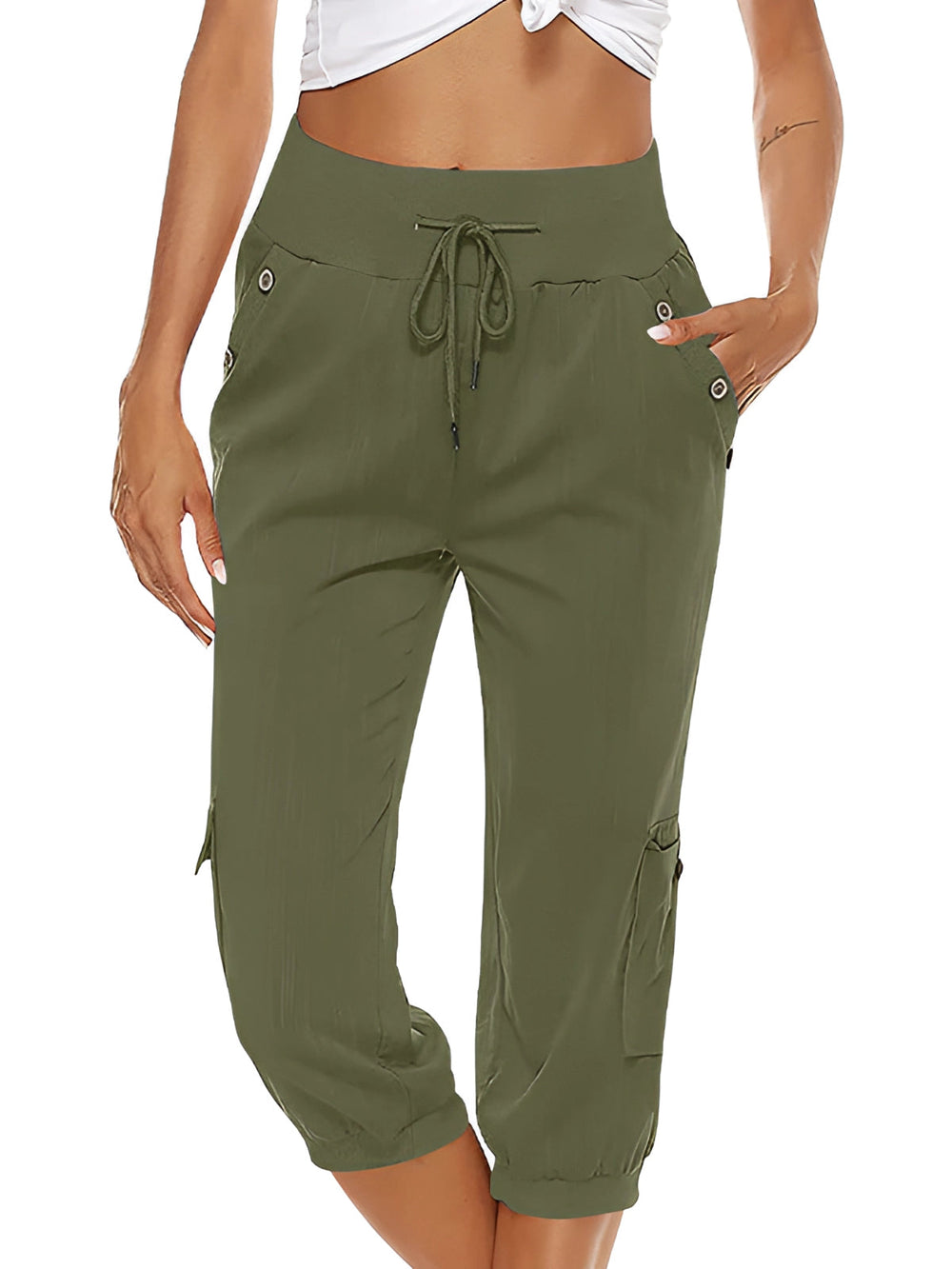 Bas femme capri vert élégant, parfait pour un look estival décontracté et confortable.