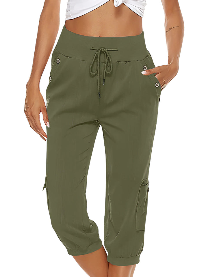 Bas femme capri vert élégant, parfait pour un look estival décontracté et confortable.