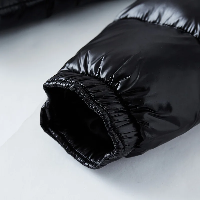 Veste matelassée noire pour homme, style moderne. Manteau d'hiver chaud et protecteur contre le froid.