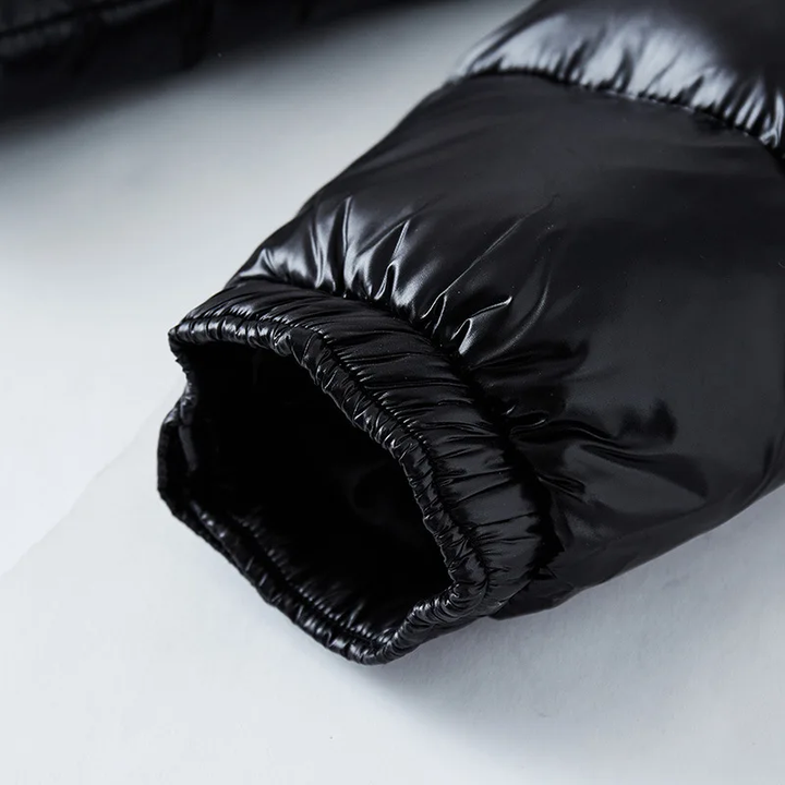 Veste matelassée noire pour homme, style moderne. Manteau d'hiver chaud et protecteur contre le froid.