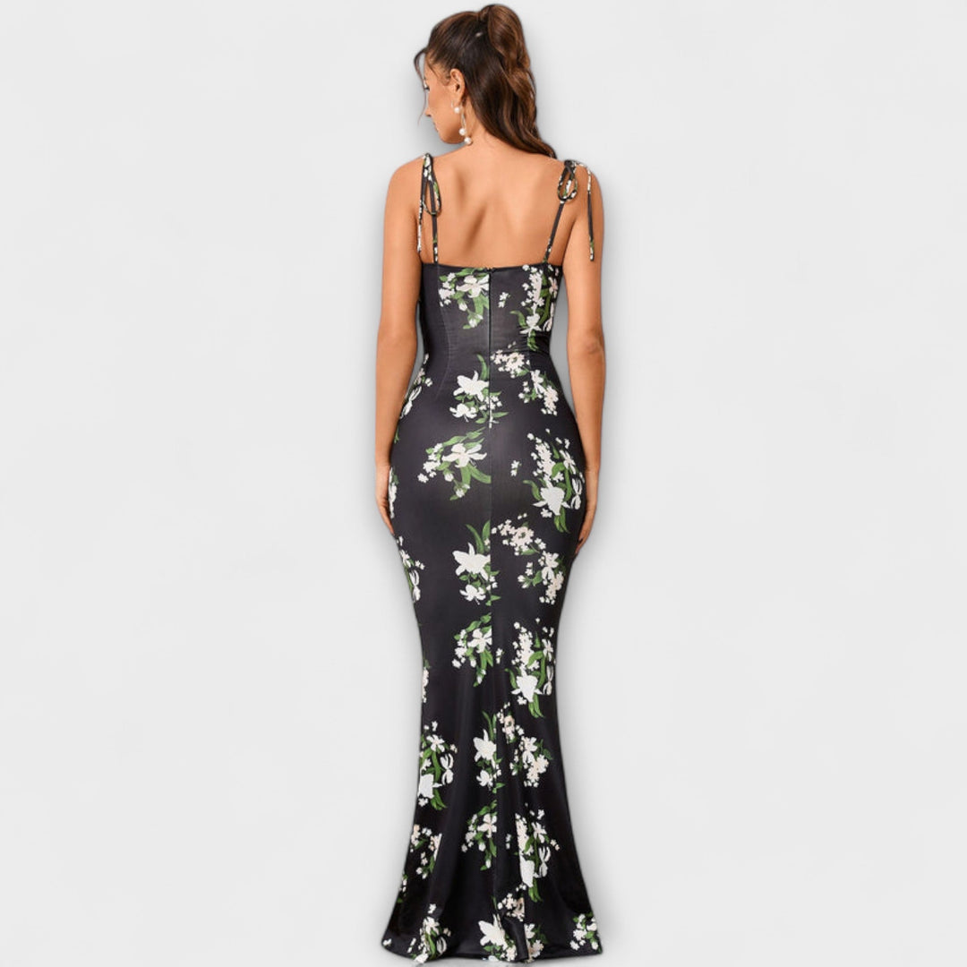 Robe longue fleurie pour femme, bretelles nouées au dos. Style sirène, parfait pour soirée.