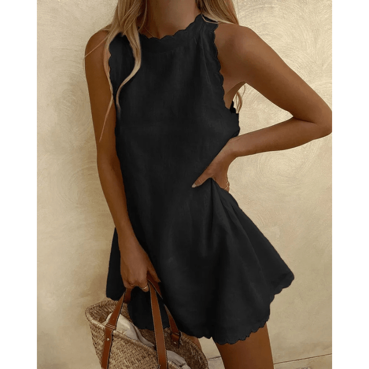 Robe midi femme sans manches, élégante et légère, parfaite pour l'été et la plage.