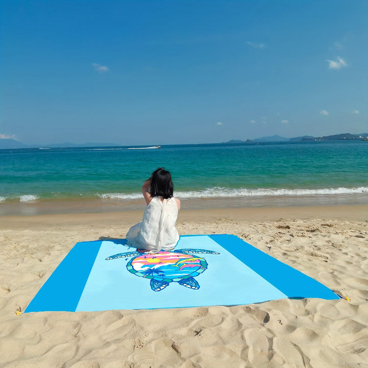 Tapis extérieur TropiComfort en polyester robuste, grand format, idéal pour la plage, les pique-niques.