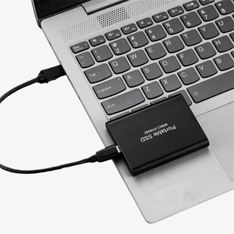Disque SSD externe portable USB 3.1 ultra rapide, idéal pour le transfert et la sauvegarde de données.