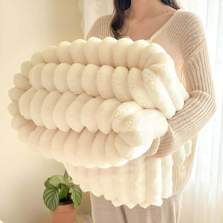 Couverture polaire ultra-douce pour un confort optimal à la maison, idéale pour canapé et chambre.