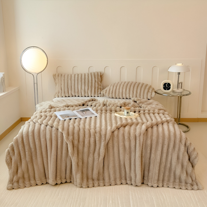 Couverture maison polaire ultra-douce, pour des moments de détente confortables sur le canapé.