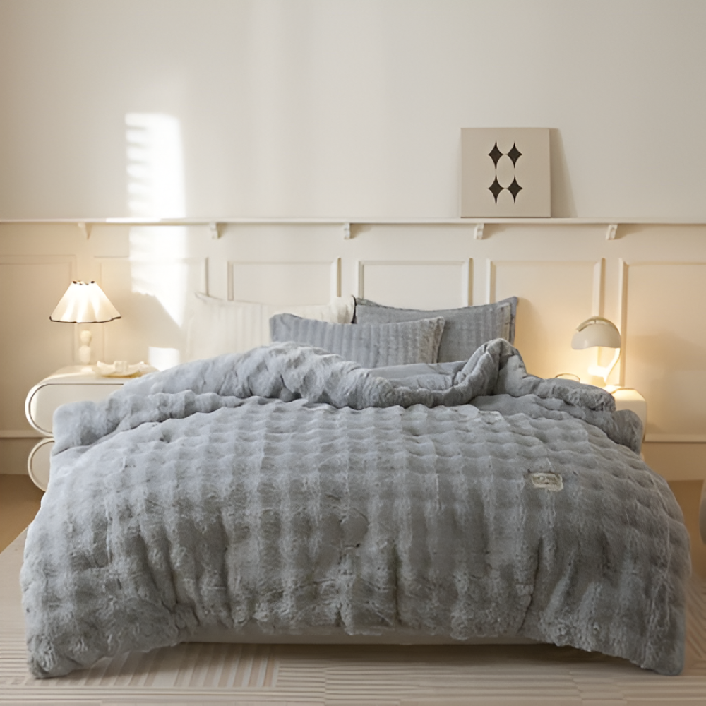 Couette VelouraDream en fleece de lait, douce et chaude, idéale pour un sommeil douillet.