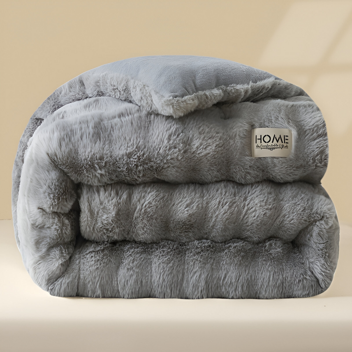 Plongez dans la douceur: couette VelouraDream, chaleur légère du fleece de lait, sommeil réparateur.