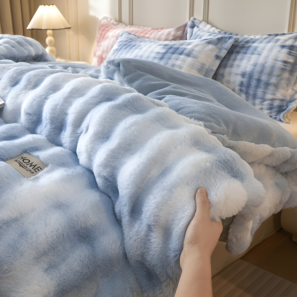 Détail de la finition de la couette VelouraDream en fleece de lait, qualité supérieure.