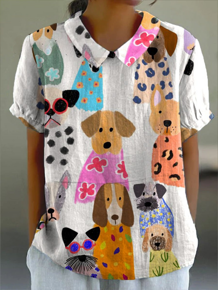 Chemise femme décontractée à manches courtes, imprimé chiens joyeux coloré, idéale pour l'été et la mode casual.
