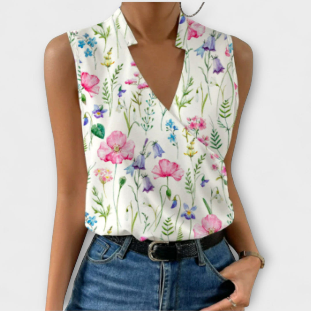 Top col V femme. Blouse mode féminine, chic et confortable. Vêtement idéal pour un été décontracté et élégant.