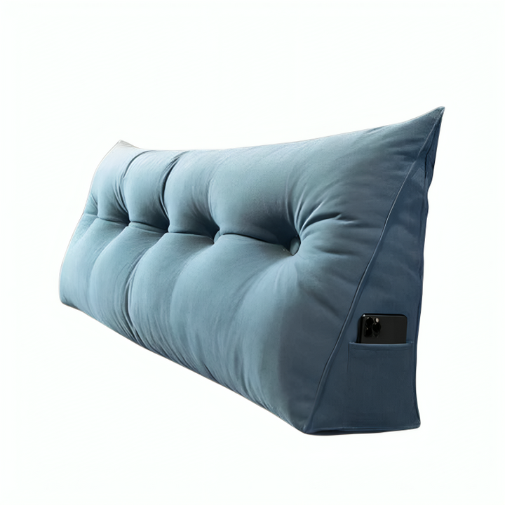 Oreiller de tête ergonomique pour lit, offrant un soutien dorsal optimal et un confort supérieur pour la lecture.