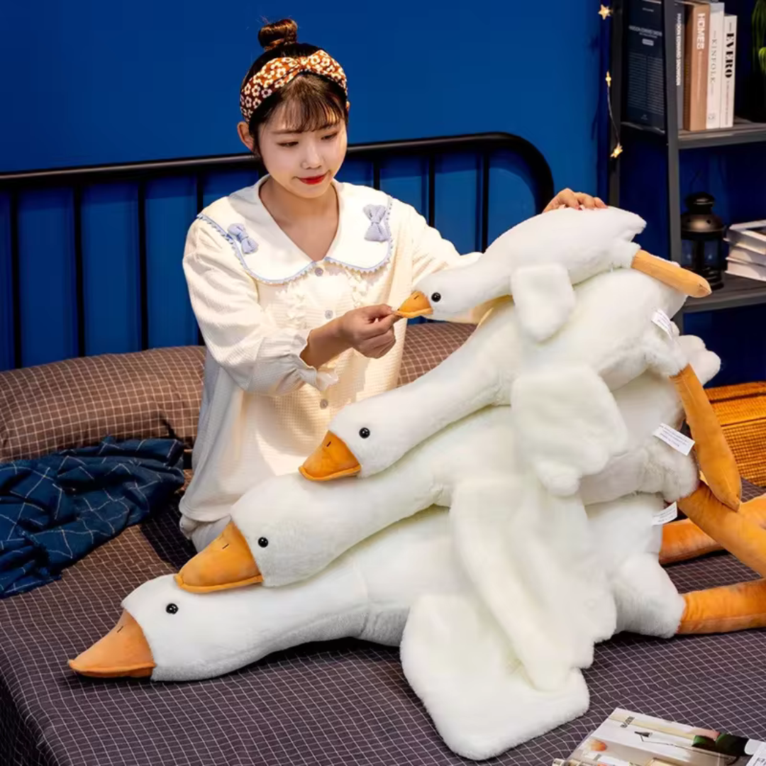 Cadeau peluche oie géante GooseHaven, doudou doux et moelleux pour enfants. Idéale pour jouer et se détendre.