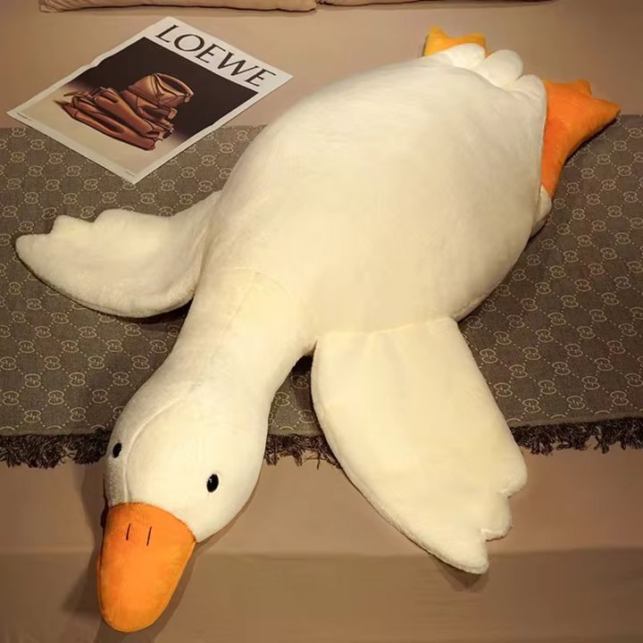 Doudou géant oie douillette, élément de décoration doux pour chambre d'enfant. Favorise la relaxation et le jeu.