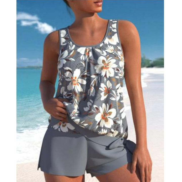 Maillot de bain tankini deux pièces femme à motif fleuri et short assorti, parfait pour un confort estival.
