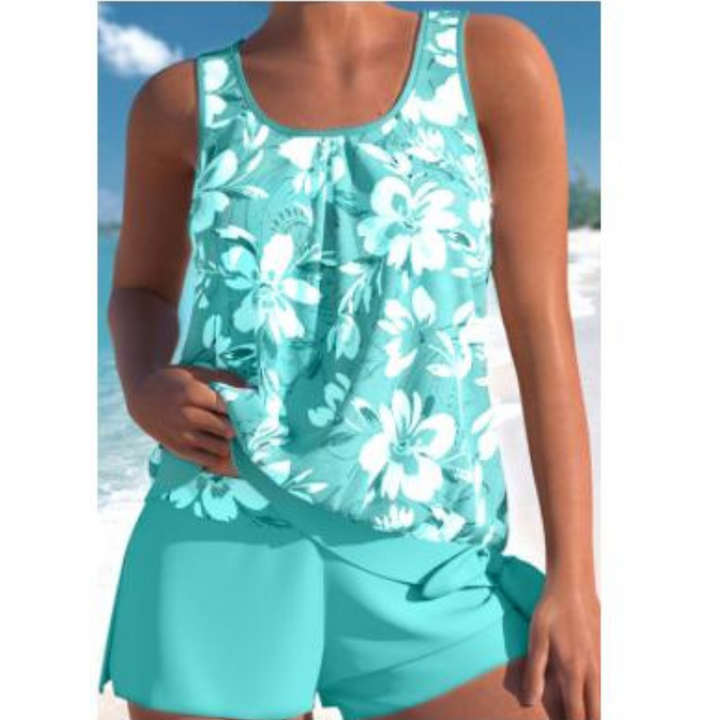 Tankini fleuri femme avec short, idéal pour la plage et la piscine. Design élégant et confortable pour l'été.