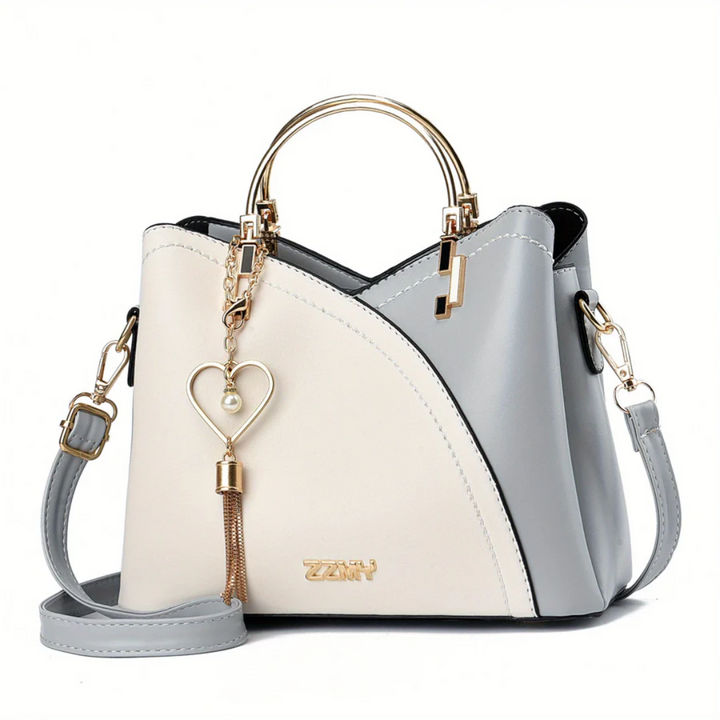 Sac à main femme en similicuir grainé marron, accessoire mode polyvalent pour le quotidien.
