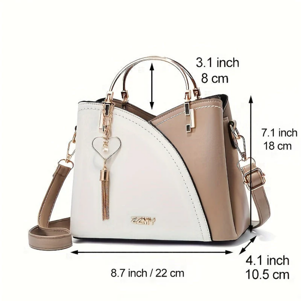 Sac à main chic en cuir noir pour femme, accessoire mode tendance et pratique.