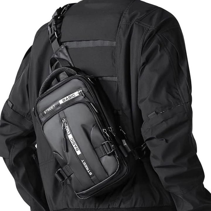 Sac à dos sling compact unisexe noir, idéal pour l'aventure et le quotidien urbain. Léger et polyvalent.
