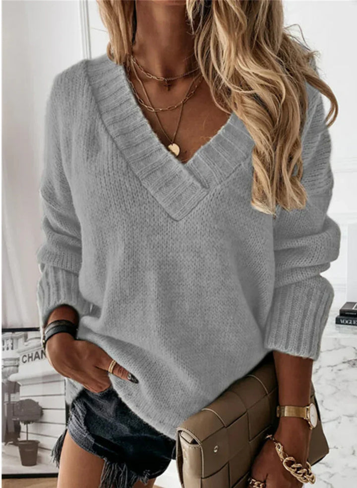 Superbe pull femme à col V, très confortable et élégant, pour un look intemporel au quotidien.