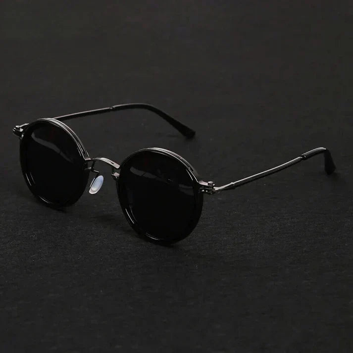 Lunettes de soleil polarisées polyvalentes, monture métal, adaptées homme et femme, avec protection UV et anti-reflets.