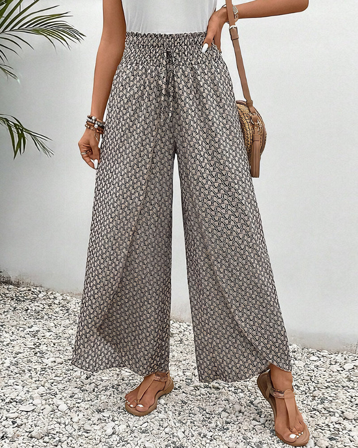 Pantalon large décontracté pour femmes, confort élégant. Idéal pour un look tendance printemps-été, chic et polyvalent.