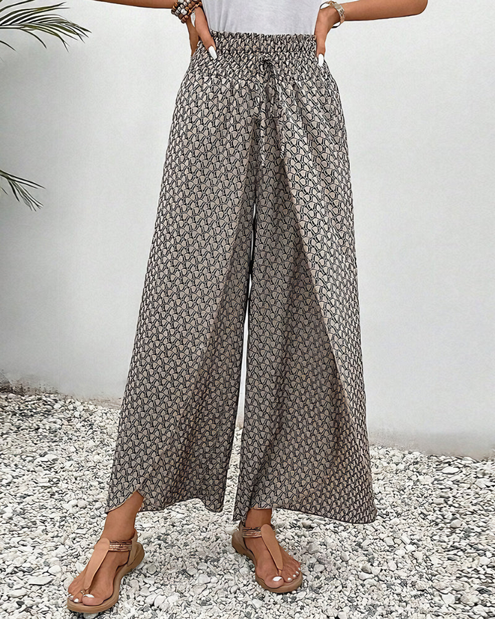 Pantalon ample pour femmes, style décontracté chic. Parfait pour le printemps et l'été, alliant mode et confort tendance.